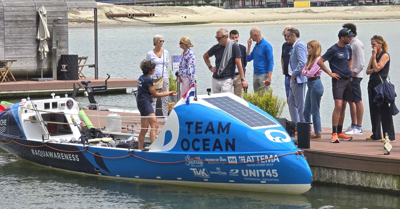 GROHE Team Ocean's team captain shows off the boat. The team will use this same boat to cross the Pacific Ocean.