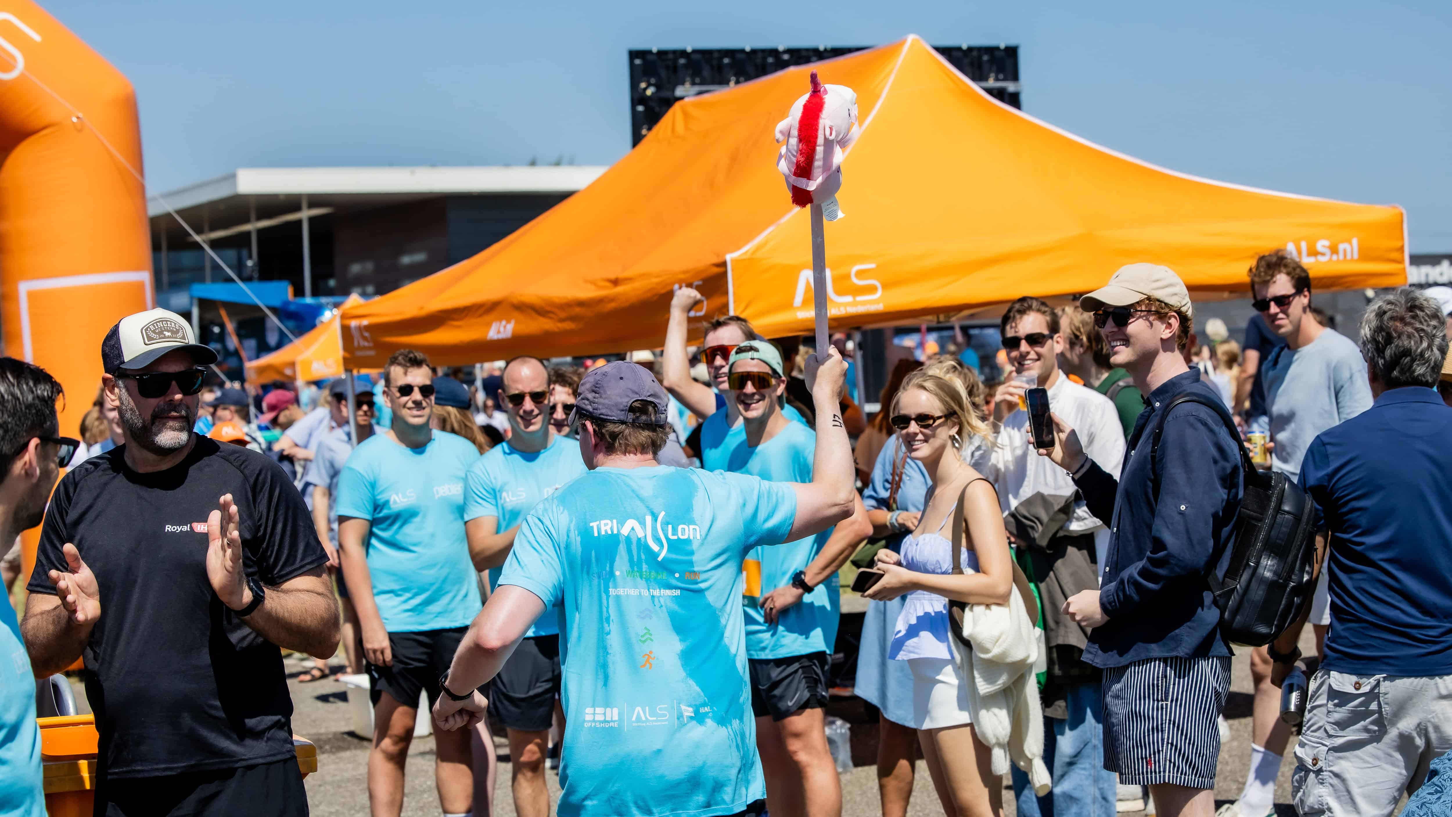 Participants and supporters gather on the TriALSlon festival site. Photo: Joris Aben.